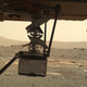 Ingenuity shown with two of its four legs unfurled, in a photo captured on March 29.
